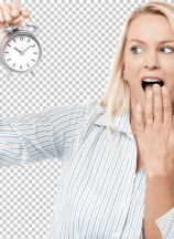 Shocked woman holding alarm clock