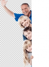 Joyful family of four behind blank whiteboard