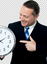 Smiling man holding a clock in his hands